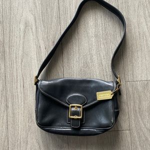 Vintage black leather Coach shoulder bag. Gold hardware.